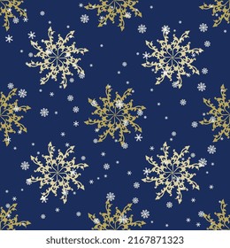 Seamless seasonal pattern with beautiful star shapes and snowflakes. Yellow gold and white spiral mandalas on blue background. New Year Christmas design.