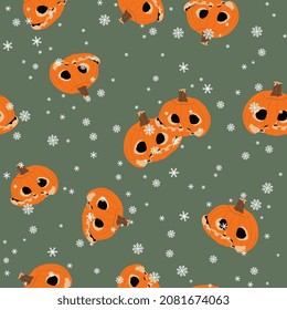 Seamless seasonal pattern with carved Halloween pumpkins and snowflakes. Jack o Lantern skull.  On green background.