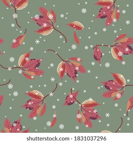Seamless seasonal pattern with red autumn leaves and snowflakes.