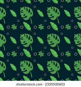 Seamless seasonal pattern with tropical leaves. Plant leaves in a seamless texture for print. Leaves of palm tree and monstera. Tropical trendy pattern on dark background