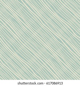 Seamless shabby diagonal stripe pattern on texture background in turquoise and beige. Endless hand drawn stripe design can be used for ceramic tile, wallpaper, linoleum, textile, web page background.