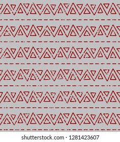 Seamless shabby etno texture pattern. Repeating geometric tiles from striped triangles