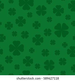 Seamless Shamrock background with dark green blades of grass on green background. St Patrick day vector illustration. Irish flat clover.