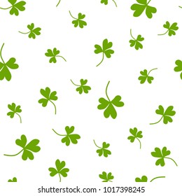 Seamless Shamrock background with white green of grass on white background. St Patrick day vector illustration. Irish hand drawn clover.  