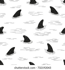 Seamless shark fin pattern. Vector black and white doodle background.