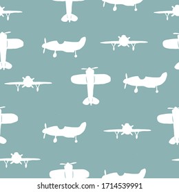 Seamless silhouette airplane pattern. Vector repeat pattern. White and blue.