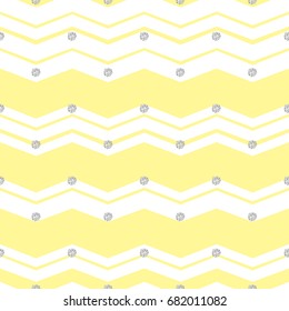 seamless silver dot glitter pattern on yellow zigzag background