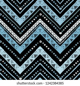 Seamless silver metallic ethnic zigzag chevron pattern. Hand drawn colorful geometric background. Striped tribal motifs. Vector illustration