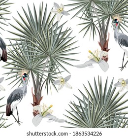 Seamless silver pattern. Tropical leaves. Fan palm leaf tropical leaves on siler blue color with Japanese crane bird on white background.