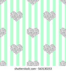seamless silver pixel heart glitter pattern on green stripe background