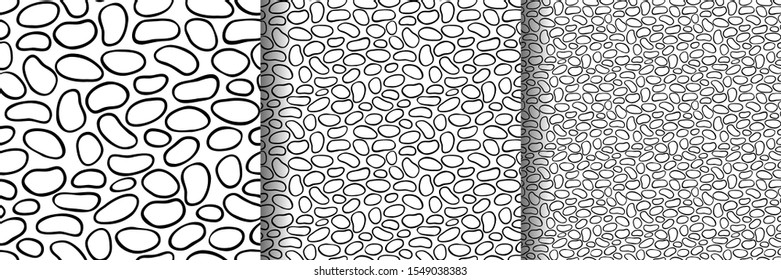 Seamless simple abstract texture with hand drawn black cobblestones isolated on white background; Vector endless stone pattern for decor, fabric print, gift wrap, invitations and wrapping paper