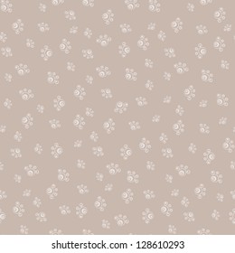 Seamless simple background. Beige pawls on pastel brown back.