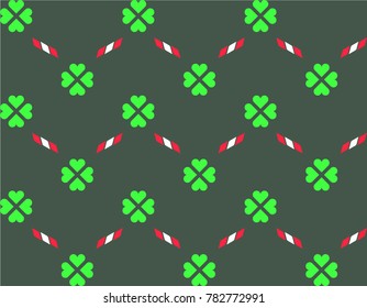 Seamless simple geometric pattern, texture. Green four leaf clover on a brown background