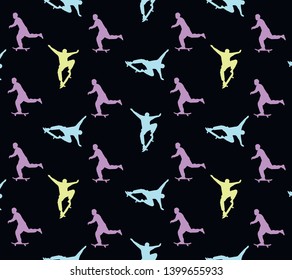 Seamless skateboarding pattern with multi-colored silhouettes of skateboarders on black background.  The guy rides a skateboard. Trick ollie. Jump. Children design.