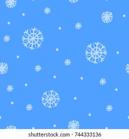 Seamless snowflake pattern on blue background. Magic night snowfall. Vector doodle ornament in funny cartoon style for your christmas decor, wrapping, wallpaper, web page and fabric design.