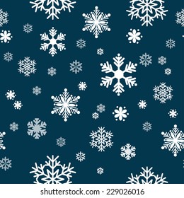 seamless snowflake pattern on a dark blue background