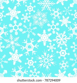 Seamless snowflakes background.