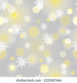 Seamless snowflakes background with boke. Winter light snowflake pattern.