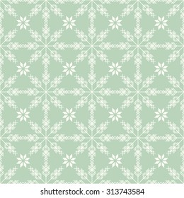 Seamless snowflakes background for winter and christmas theme. Vector illustration.