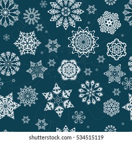 Seamless snowflakes on a blue background. Vector illustration.