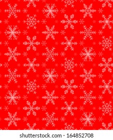 Seamless snowflakes pattern on the red background