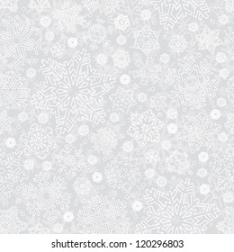 Seamless snowflakes pattern, vector illustration. Seasonal festive backdrop in silver. Light winter background for your design.