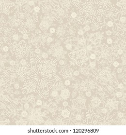 Seamless snowflakes pattern, vector illustration. Seasonal festive backdrop in beige. Pastel winter background for your design.