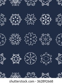 Seamless snowflakes pattern, white on a blue background, vector
