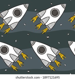Seamless space pattern with hand-drawn rockets and stars. Cartoon spaceship in the galaxy. Vector illustration