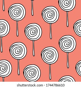 Seamless spiral shaped sweets. Lollipop. Contour drawing lollipops with a black liner on a pink background. Vector image Printing on textiles, covers for laptops, menus, packaging.