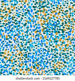 Seamless spotted pattern. Summer ditsy floral all over print. Abstract geometric background with multicolored dots. Trendy flat mottled and dotted texture. Designed for textile, fabric any surfaces.