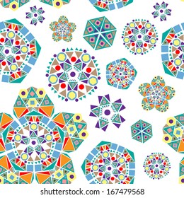 Seamless spring background with flowers made of geometric shapes