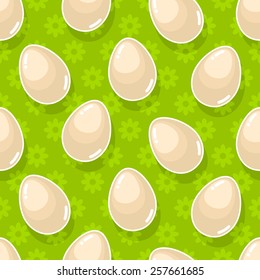 Seamless spring pattern with Easter eggs on green floral background