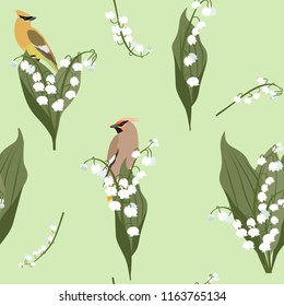 Seamless spring vector illustration with lily of the valley and bird waxwing on a green background. For decoration of textiles, packaging, wallpaper.