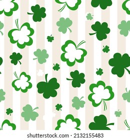 Seamless St. Patrick's Day pattern of Irish symbols. Green clover leaf and other hand drawn elements. Vector backgrounds for holiday invitation, greeting card or flyer