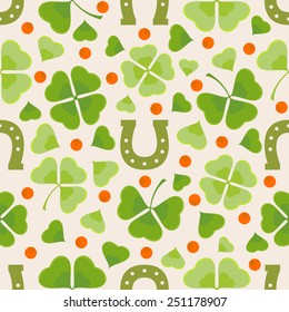 Seamless St. Patrick`s day vector pattern with clover leaves and horseshoe in green and red on beige background. Perfect for wallpapers, pattern fills, web backgrounds, greeting cards, invitations