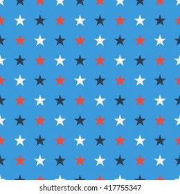 Seamless star pattern in blue, white and red solid colors on light blue background