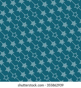 Seamless stars pattern. Dotted star shapes in garlands. Christmas beads pattern. Pattern of garlands. Chevrons of stars. Vector Regular Texture