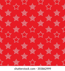 Seamless stars pattern on red background. Chevrons of stars. Dotted star shapes in garlands. Christmas beads pattern. Christmas holiday pattern of garlands.  Vector Regular Texture