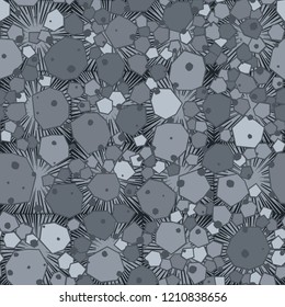 Seamless stone camouflage on a background of square suns.