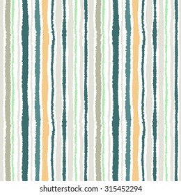 Seamless strip pattern. Vertical lines with torn paper effect. Shred edge background. Light, contrast, turquoise, gray, yellow, olive, blue colors on white background. Winter theme. Vector
