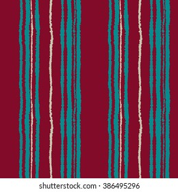 Seamless strip pattern. Vertical lines with torn paper effect. Shred edge texture. Turquoise, vinous, white  colored background. Vector