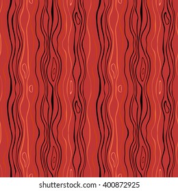 Seamless striped nature pattern. Vertical narrow wavy lines. Bark, branches of trees, tropical forest theme texture. Red, orange, black colored background. Vector