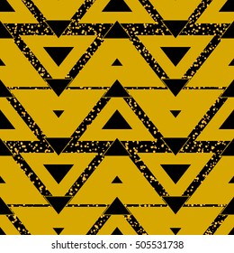 Seamless striped pattern of alternating yellow lines zigzag, gold dust and black triangles. Fantastic, futuristic vector background.