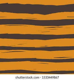 seamless striped pattern in tiger coloring is drawn by hand with rough lines