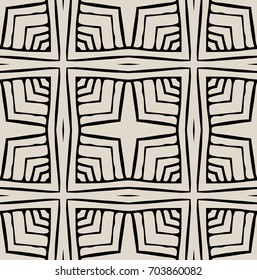 Seamless striped vector pattern. Vintage colored decorative repainting background with tribal and ethnic motifs. Abstract geometric roughly hatched shapes colored with hand drawn brush stokes.
