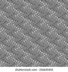 Seamless stylish geometric background. Modern abstract pattern. Flat monochrome design.Monochrome pattern with gray and black dotted diagonal waves on gray.