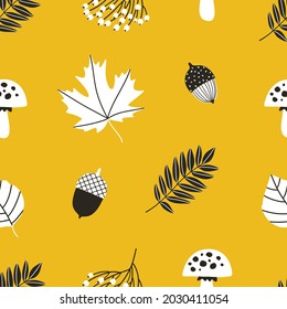 Seamless stylish pattern of colorful autumn symbols. Floral background of autumn attributes - leaves, acorns, rowan, mushrooms. Vector illustration
