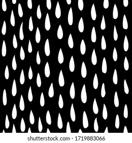 Seamless stylish pattern. White drops on black background. Hand drawn.