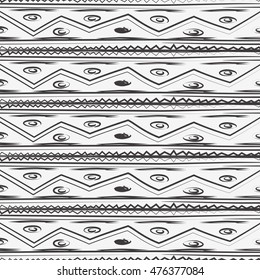 Seamless stylized chevron pattern with aztec ethnic and tribal ornament. Vector black and white fashion illustration.